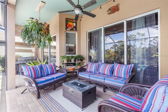 view of patio featuring outdoor lounge area, ceiling fan, and a grill