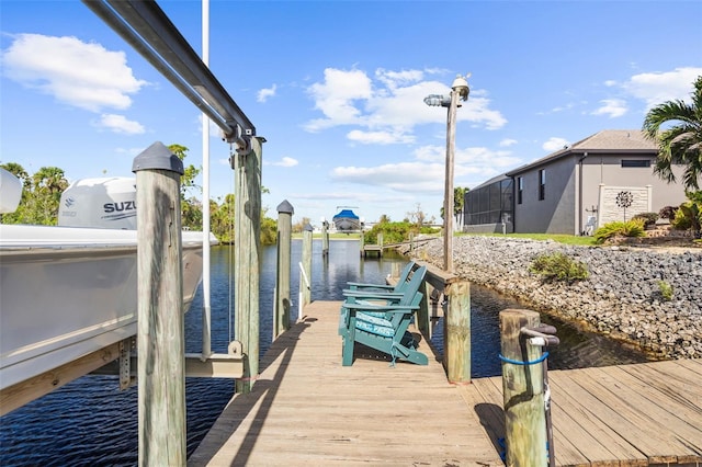 dock area featuring a water view