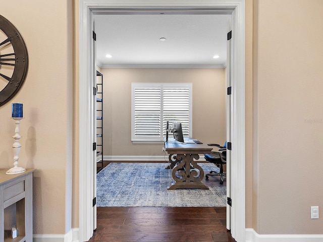 office featuring ornamental molding and dark hardwood / wood-style flooring