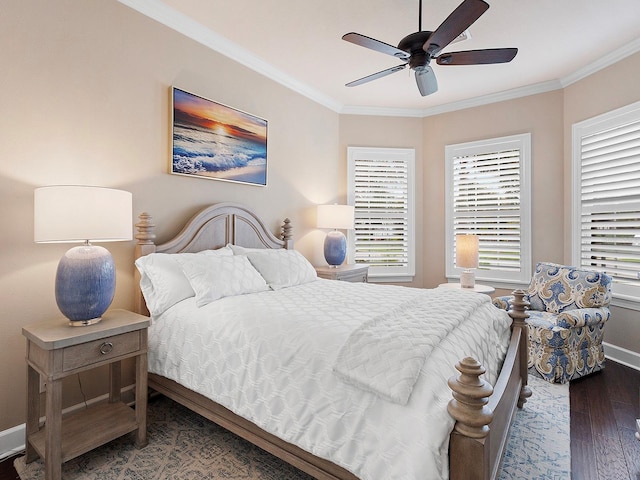 bedroom featuring dark hardwood / wood-style floors, ornamental molding, and ceiling fan