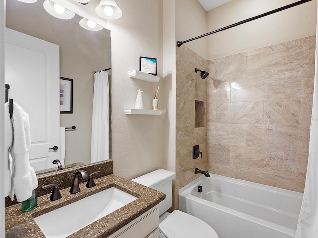 full bathroom with shower / bath combination with curtain, vanity, and toilet