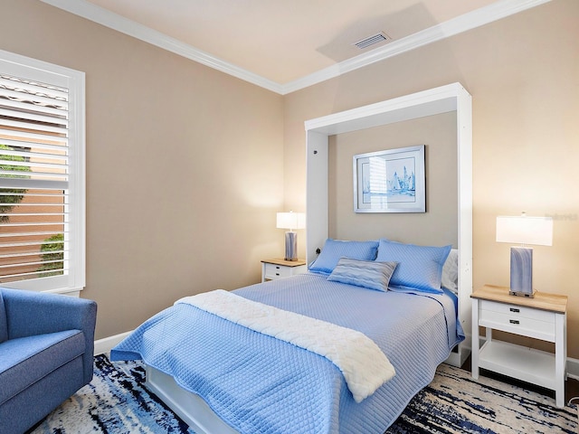 bedroom with ornamental molding