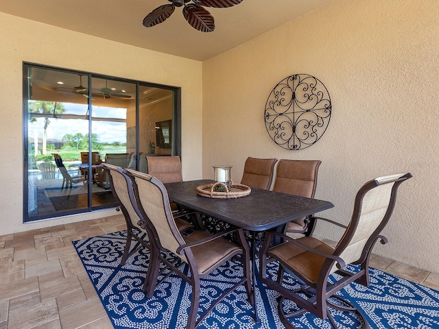 dining space featuring ceiling fan