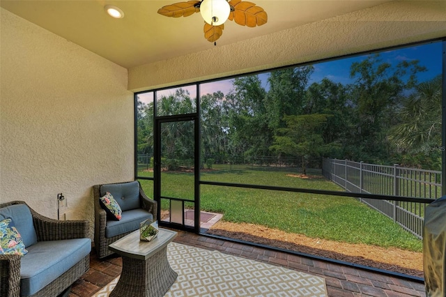 7572 Viola Loop, Lakewood Ranch, FL 34202 - sunroom with a ceiling fan and an outdoor hangout area