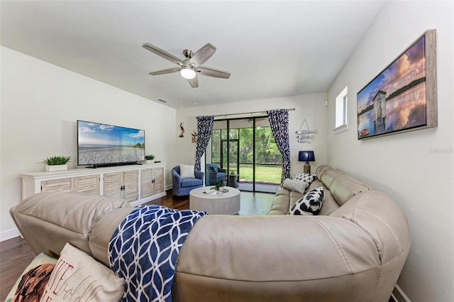 7572 Viola Loop, Lakewood Ranch, FL 34202 - living room with dark wood finished floors and ceiling fan