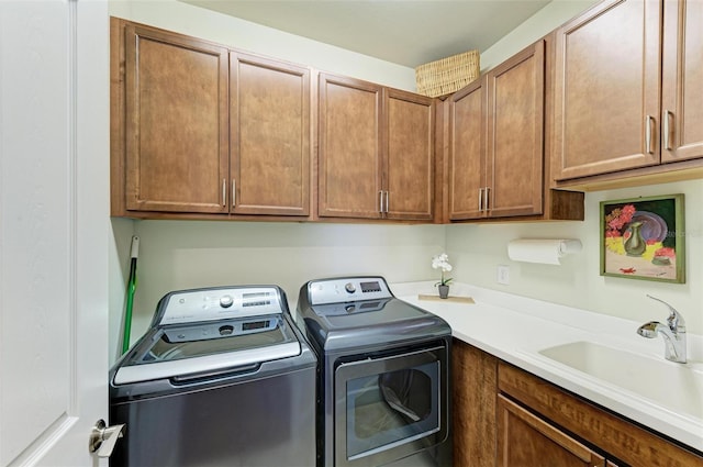 7572 Viola Loop, Lakewood Ranch, FL 34202 - laundry room featuring washing machine and clothes dryer and cabinet space