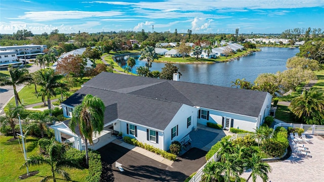 birds eye view of property featuring a water view