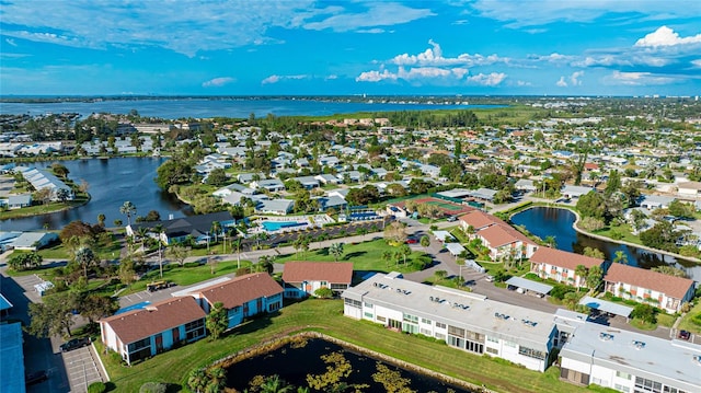 birds eye view of property featuring a water view