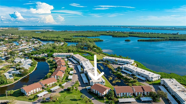 birds eye view of property featuring a water view