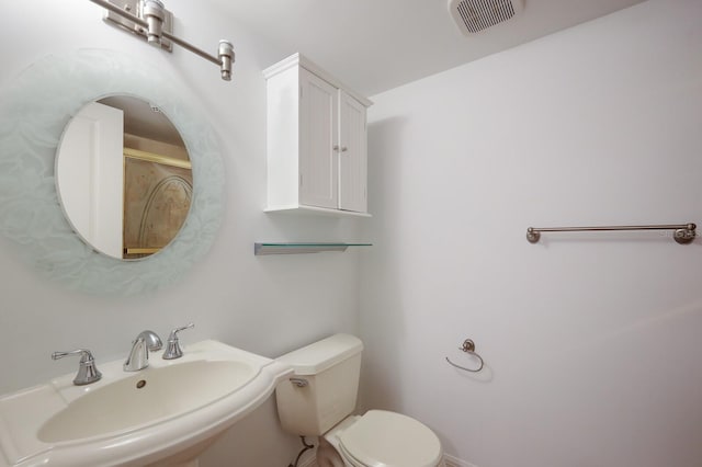 bathroom with sink and toilet