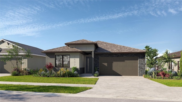 view of front of home with a garage and a front lawn