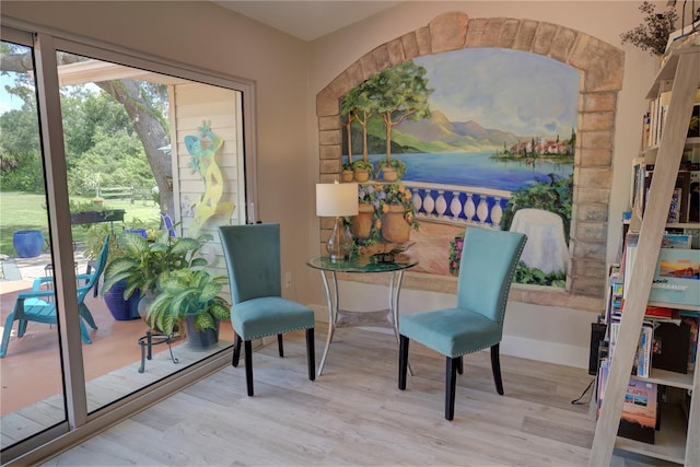 sitting room featuring hardwood / wood-style floors