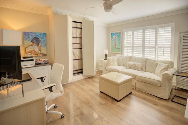 office area featuring crown molding, ceiling fan, and light hardwood / wood-style flooring