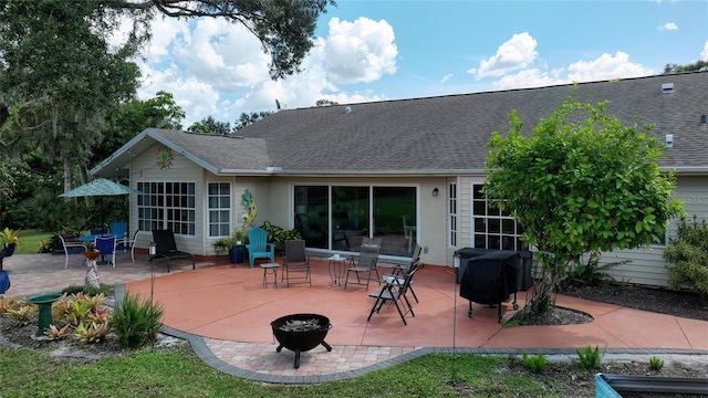 back of property featuring a patio