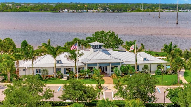 birds eye view of property featuring a water view