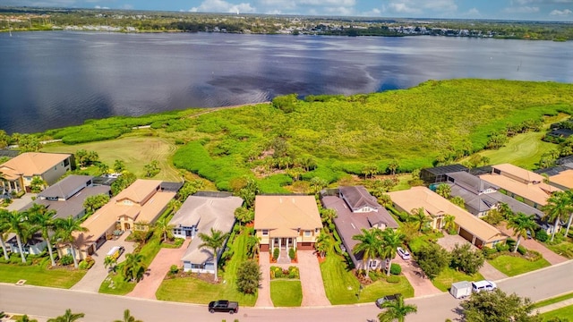 bird's eye view with a water view