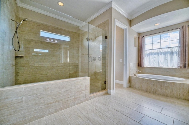 bathroom featuring crown molding and independent shower and bath