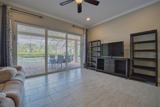 living room featuring ceiling fan and ornamental molding