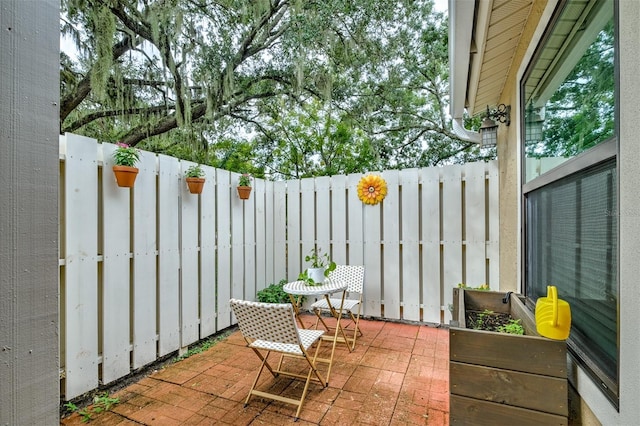 balcony with a patio area