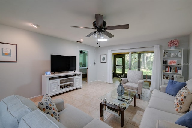 living room with baseboards, recessed lighting, light tile patterned floors, visible vents, and ceiling fan