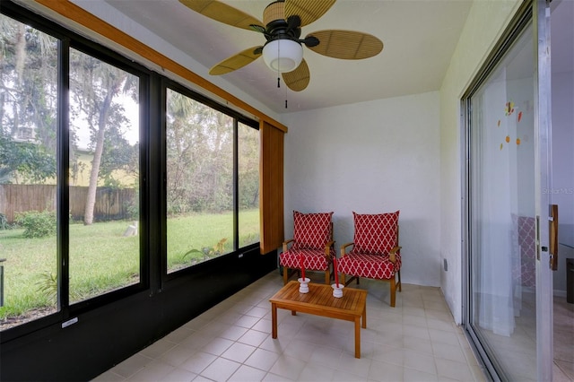 sunroom / solarium with ceiling fan