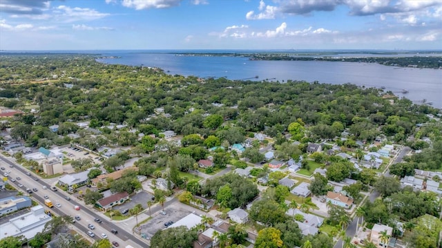 bird's eye view featuring a water view and a residential view