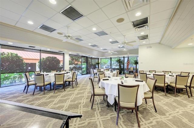 dining room featuring carpet floors and ceiling fan