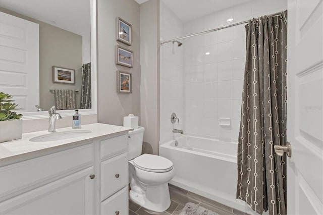 full bath with toilet, vanity, and shower / bath combination with curtain