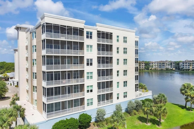 view of property with a water view