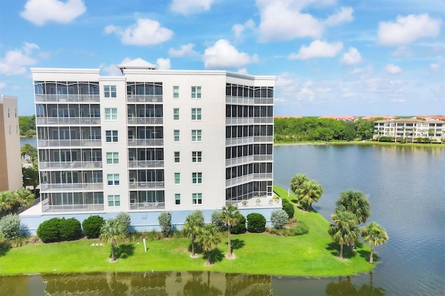 view of building exterior with a water view