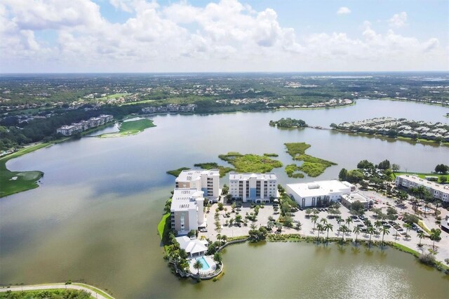 drone / aerial view with a water view