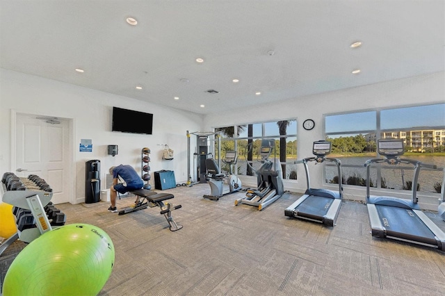 workout area with visible vents, carpet floors, and recessed lighting