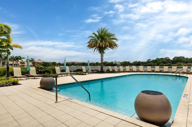 view of pool featuring a patio