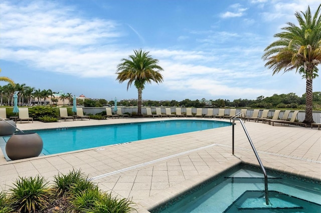 view of pool featuring a patio