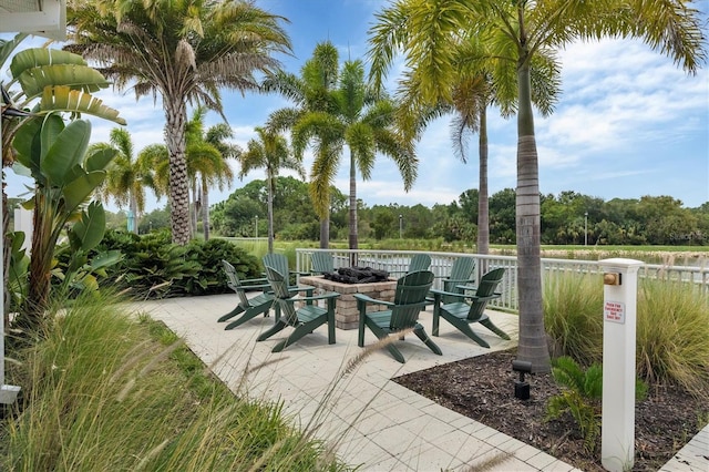 view of patio / terrace with an outdoor fire pit