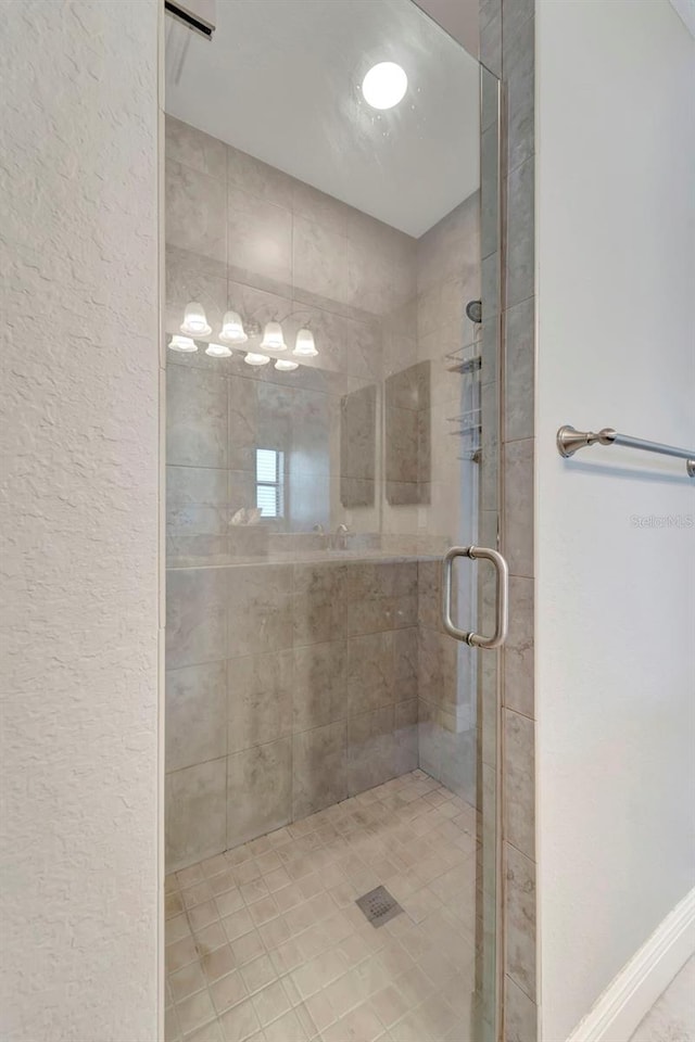 bathroom with an enclosed shower