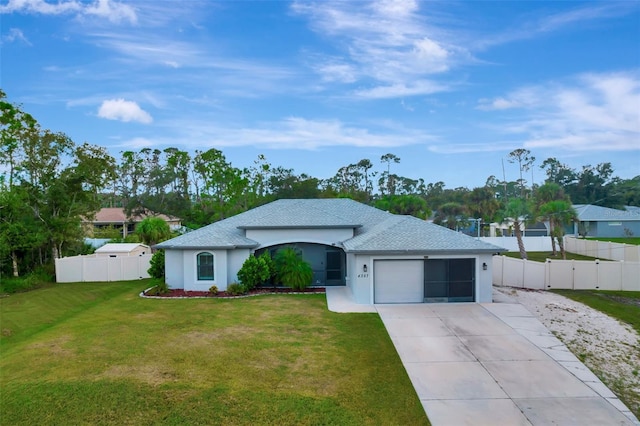 ranch-style house with a garage and a front yard