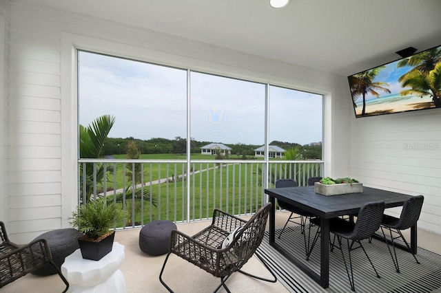 sunroom featuring a healthy amount of sunlight