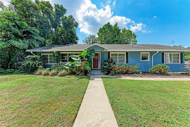 ranch-style house with a front yard