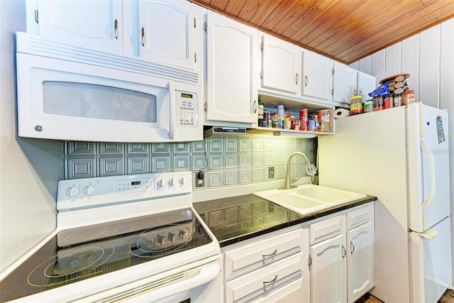 kitchen with decorative backsplash, wood ceiling, white cabinets, white appliances, and sink