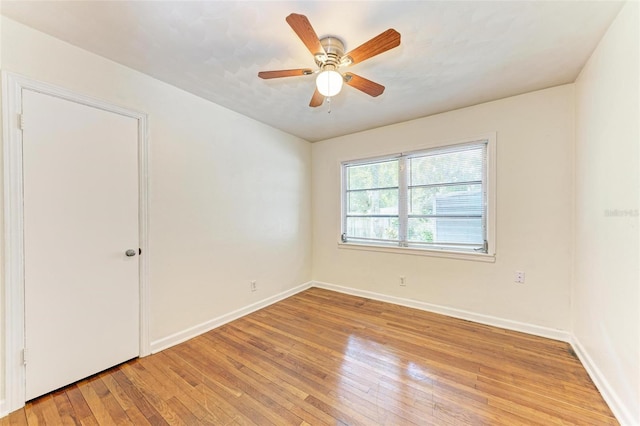 unfurnished room featuring light hardwood / wood-style flooring and ceiling fan