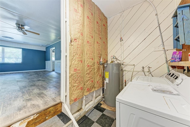 washroom with ceiling fan, wood walls, separate washer and dryer, dark hardwood / wood-style floors, and electric water heater