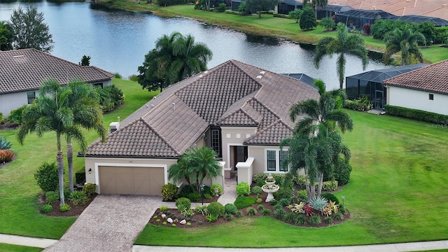 birds eye view of property featuring a water view