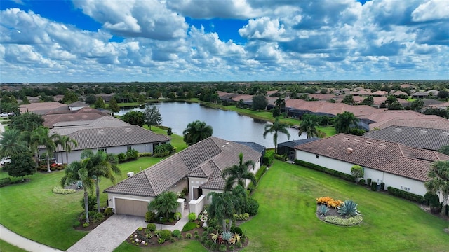 drone / aerial view with a water view