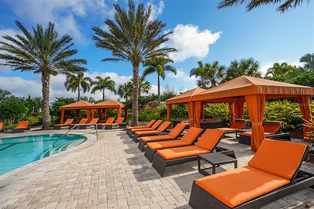 view of pool featuring a gazebo and a patio