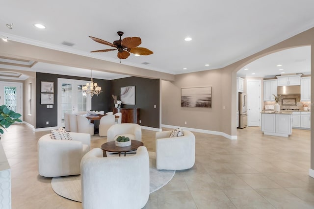 12663 Fontana Loop, Bradenton, FL 34211 - living room featuring arched walkways, a chandelier, crown molding, a ceiling fan, and recessed lighting