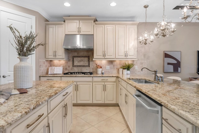 12663 Fontana Loop, Bradenton, FL 34211 - kitchen with appliances with stainless steel finishes, under cabinet range hood, a chandelier, cream cabinets, and light tile patterned floors