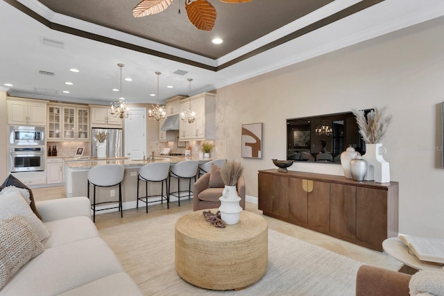 12663 Fontana Loop, Bradenton, FL 34211 - living area featuring a chandelier, ornamental molding, recessed lighting, ceiling fan, and light tile patterned floors