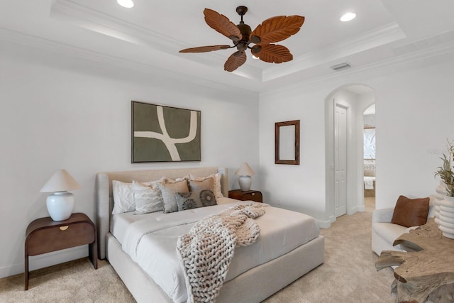 12663 Fontana Loop, Bradenton, FL 34211 - bedroom with a raised ceiling, crown molding, arched walkways, light carpet, and recessed lighting