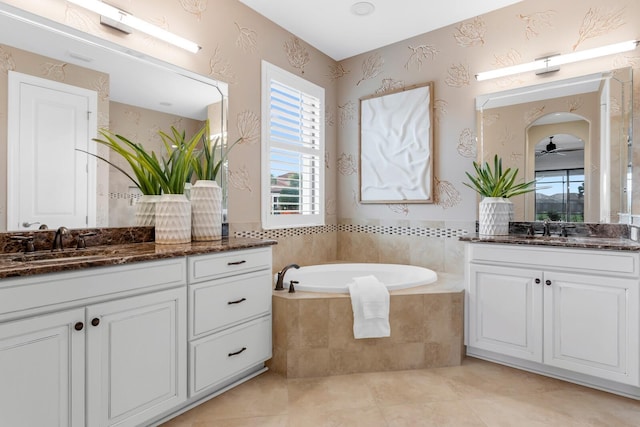 12663 Fontana Loop, Bradenton, FL 34211 - bathroom with two vanities, a bath, tile patterned flooring, and ceiling fan